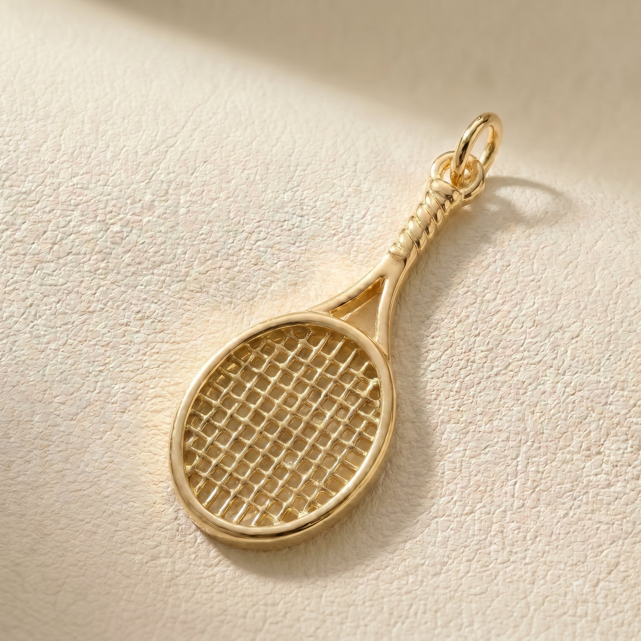 CORTIVO gold racket charm